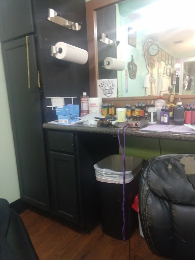 Explore red tattoo cover up ideas, creative tattoo ideas in Lafayette, available at Crown & Anchor Tattoos