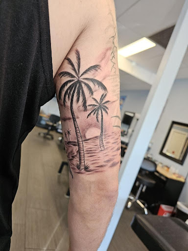 Explore women's side tattoo ideas, creative tattoo ideas in Palm Harbor, available at Angry Owl Tattoo and Piercing