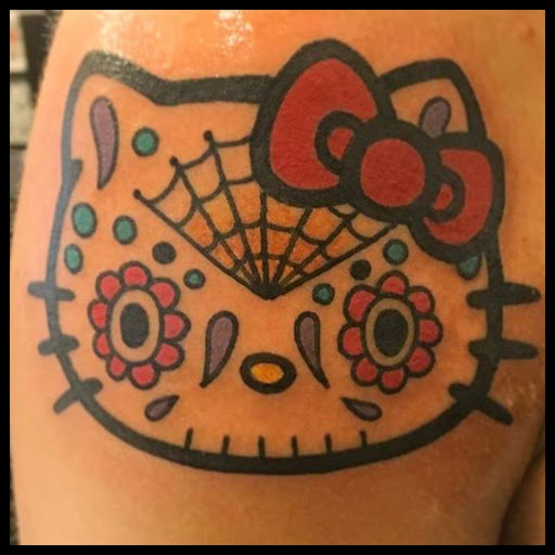 Explore feminine cross tattoo ideas, creative tattoo ideas in Anaheim, available at Torch Tattoo