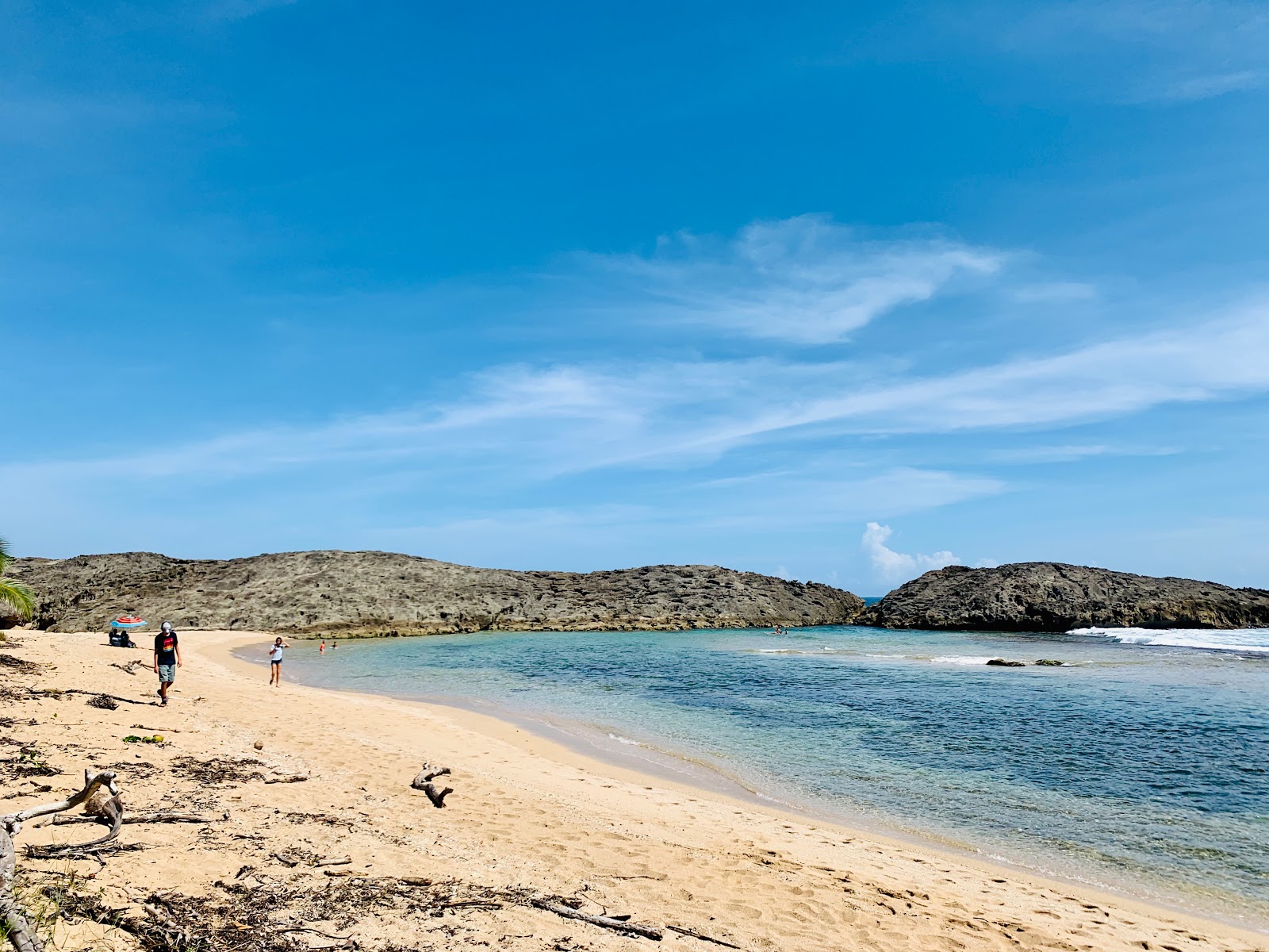 Zdjęcie Playa Tombolo beach z powierzchnią jasny piasek