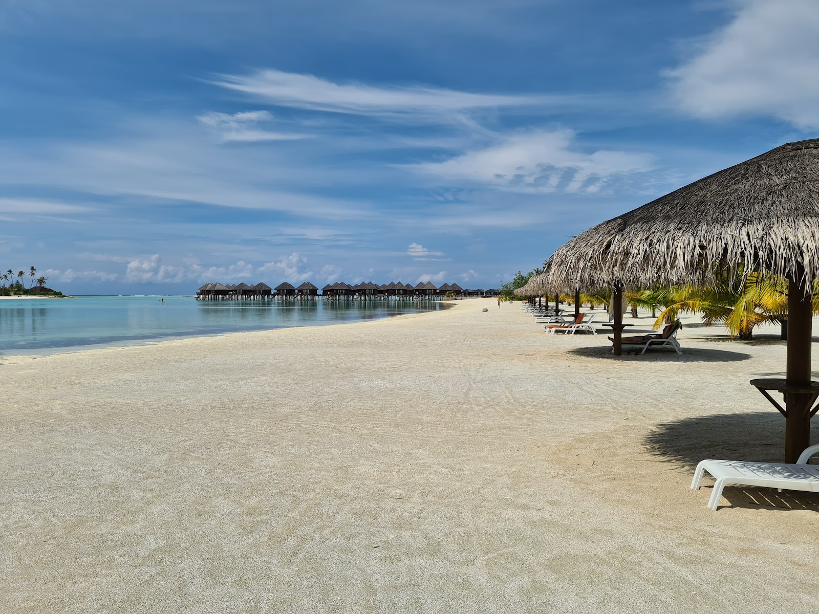 Sun Siyam Olhuveli Plajı'in fotoğrafı - rahatlamayı sevenler arasında popüler bir yer