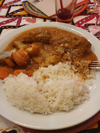 Poulet au curry du Restaurant de spécialités d'Afrique de l'Ouest Le Village à Paris - n°5