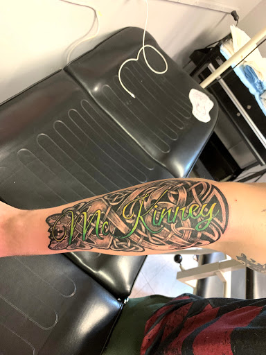 Explore rip cross tattoo ideas, creative tattoo ideas in Hudson Falls, available at ALTERED ADDICTION TATTOOS