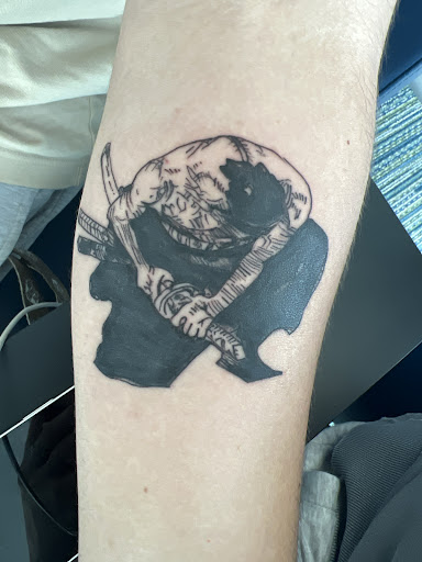 Explore alpha tattoo ideas, creative tattoo ideas in Ocoee, available at Fine Ink Studios Tattoos