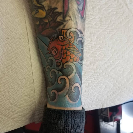 Tattoo Shop «Atomic Tattoos», reviews and photos, 1507 E North Ave, Milwaukee, WI 53202, USA