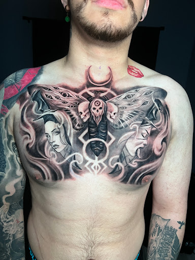 Explore demon slayer sword tattoo ideas, creative tattoo ideas in Fontana, available at Iconiq Tattoo Studio