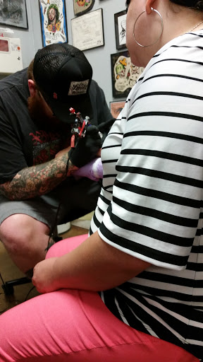 Tattoo Shop «Jolly Roger Tattoo», reviews and photos, 1375 Rock Quarry Rd #203, Stockbridge, GA 30281, USA