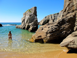 Plage de Port Goulom'in fotoğrafı geniş bir kıyı şeridi ile birlikte