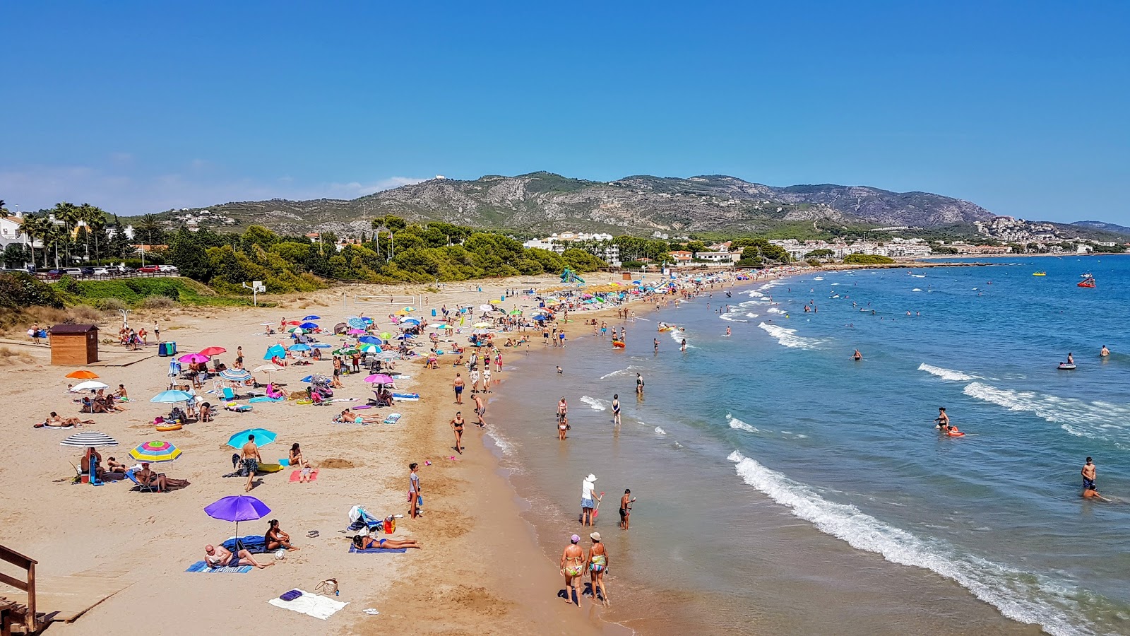 Foto di Spiaggia Romana con una superficie del sabbia marrone
