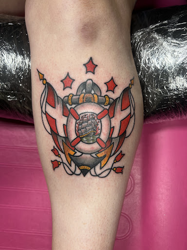 Explore cross cover up tattoo ideas, creative tattoo ideas in Huntsville, available at Black Hearts Tattoo and Body Piercing