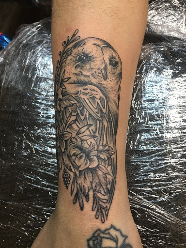 Explore lv tattoo ideas, creative tattoo ideas in Warner Robins, available at Untold Pain Tattoo Studio