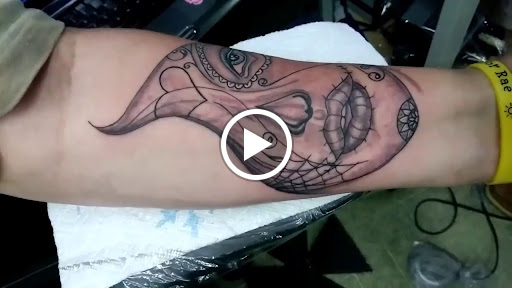 Find feminine skull tattoos ideas for your next unique tattoo in Danville at Blue Moon Tattoo & Body Piercing