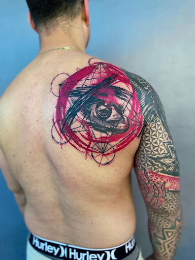 Explore back tattoos ideas guys, creative tattoo ideas in Miami, available at Inkaholik Tattoos Kendall
