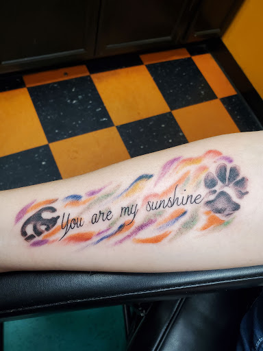 Explore ear tattoo ideas, creative tattoo ideas in Marion, available at Peezys Tattoos & Body Piercings