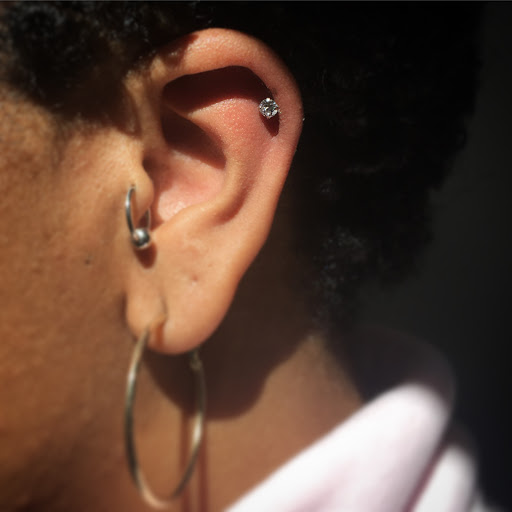 Explore lower belly tattoo ideas, creative tattoo ideas in Cary, available at Fine Art Body Piercing By Lilith Mae