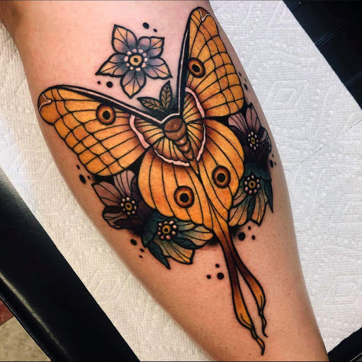 Explore spartan helmet tattoo ideas, creative tattoo ideas in Burlington, available at Inferno Ink Tattoo & Body Piercing Studio