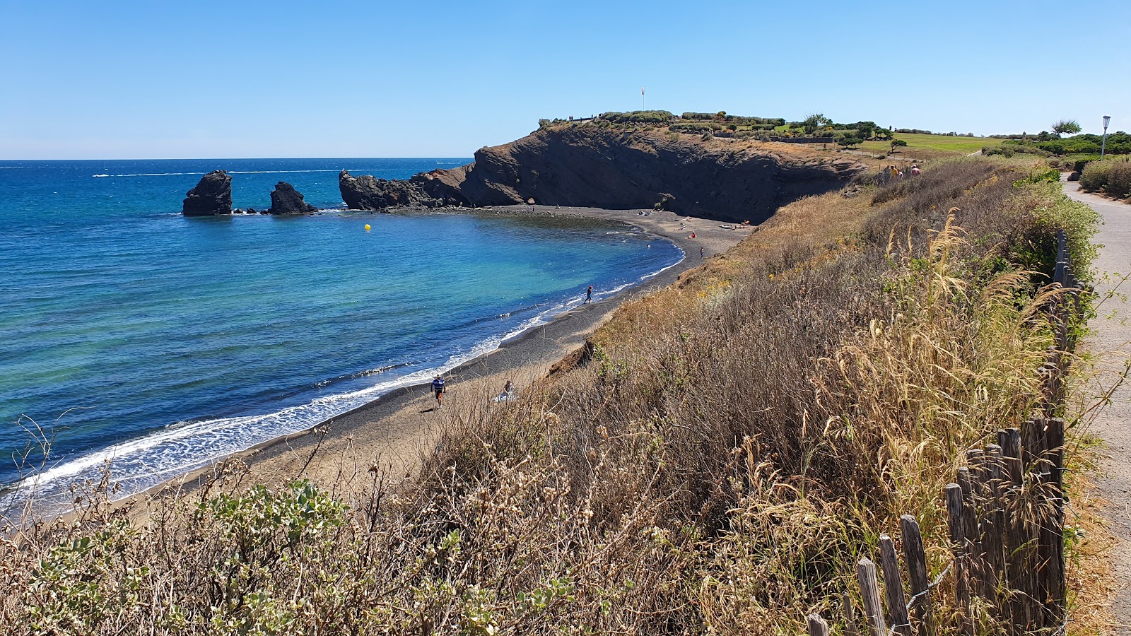 Photo of La Conque beach with spacious bay