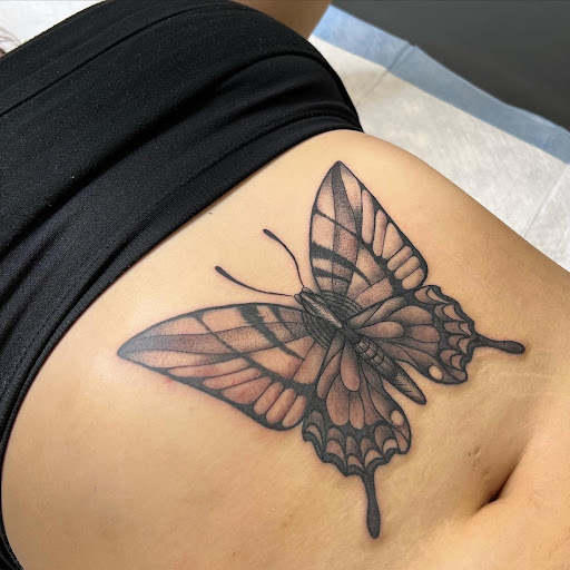 Explore military dog tag tattoo ideas, creative tattoo ideas in Port Orange, available at Electric Shark Tattoo Studio