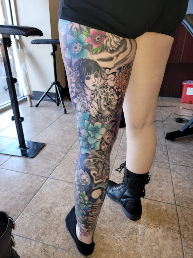 Explore neck tattoo men ideas, creative tattoo ideas in Onalaska, available at Rock Bottom Tattoo Studio