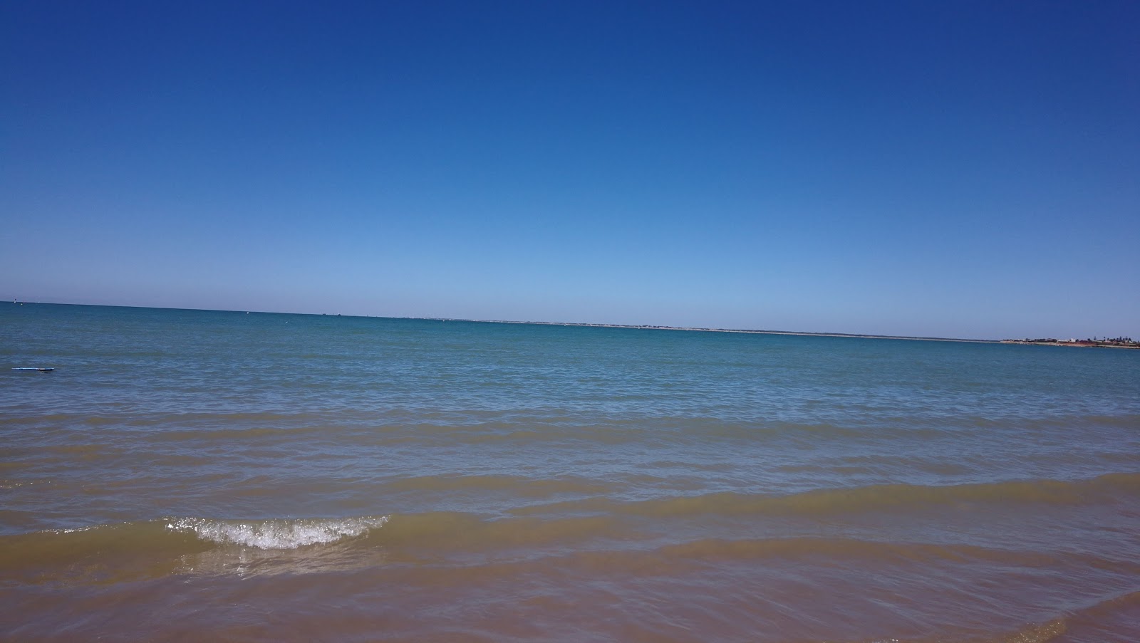 Foto di Playa Micaela con una superficie del acqua verde-blu