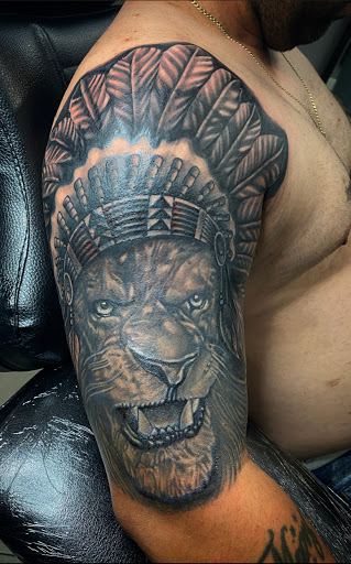 Explore knee scar tattoo ideas, creative tattoo ideas in Passaic, available at District 36 Tattoo Parlor