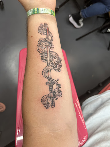 Explore negative space tattoo ideas, creative tattoo ideas in Myrtle Beach, available at Elite Ink Tattoos of Myrtle Beach