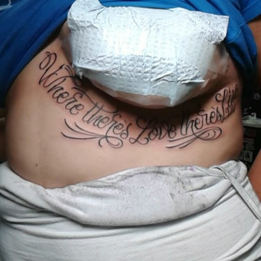 Explore stamp tattoo ideas, creative tattoo ideas in Stockton, available at Stockton Tattoo & Piercing