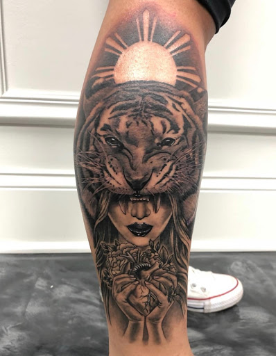 Explore shin tattoo ideas, creative tattoo ideas in Warrenville, available at UpRise Tattoos