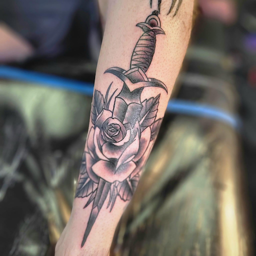 Explore volleyball tattoo ideas, creative tattoo ideas in Fulton, available at The Kings Head Tattoo Company