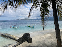 Nyuh Ivory Beach'in fotoğrafı uçurumlarla desteklenmiş