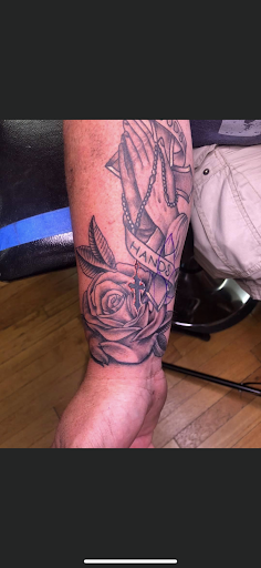 Explore fishnet tattoo ideas, creative tattoo ideas in Crossville, available at Paragon Tattoos & Piercing