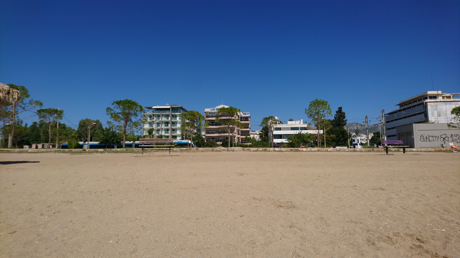 Fotografie cu Glyfada Beach și așezarea