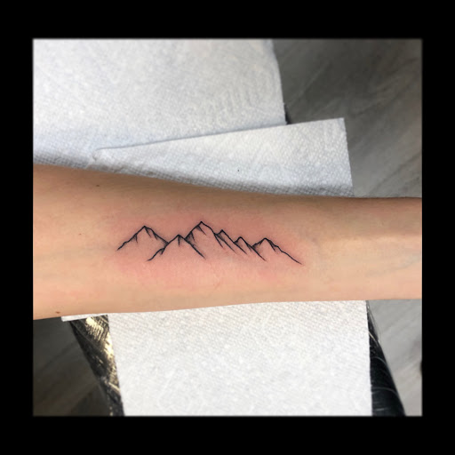 Explore tattoo ideas for guys ribs, creative tattoo ideas in Londonderry, available at Billy Goat Tattoo