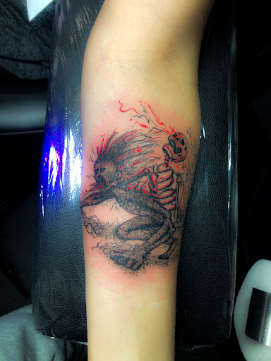 Explore forearm half sleeve tattoo ideas for men, creative tattoo ideas in Bowling Green, available at Ink Therapy and Body Piercing