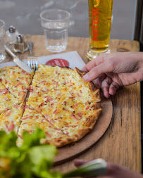 Tarte flambée du Restaurant de spécialités alsaciennes L'Alsacien Besançon à Besançon - n°11