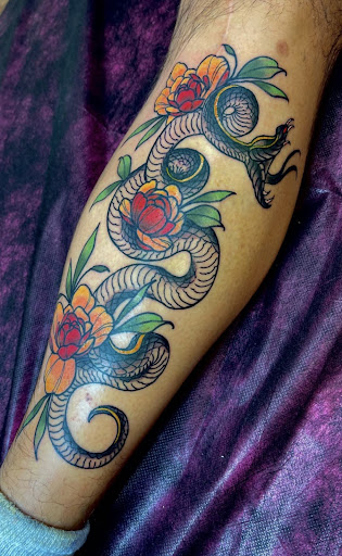 Explore calf tattoo ideas for women, creative tattoo ideas in Baltimore, available at Rippd Canvas Tattoo Shop Artists Social Club