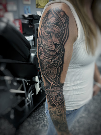 Explore tennis tattoo ideas, creative tattoo ideas in Fort Myers, available at Loyal 2 The Coil Tattoos & Piercings (Edison Mall Location Entrance F)