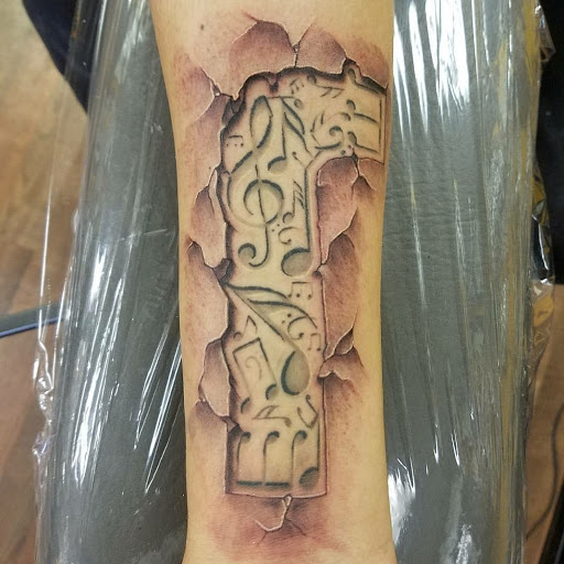 Explore last name tattoo ideas, creative tattoo ideas in Stockton, available at THE PIRATES LOUNGE TATTOO PARLOR