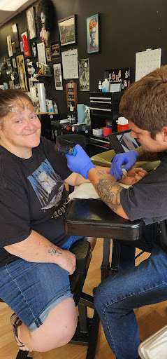 Explore lizard tattoo ideas, creative tattoo ideas in Bellevue, available at Blak Sheep Tattoo Company