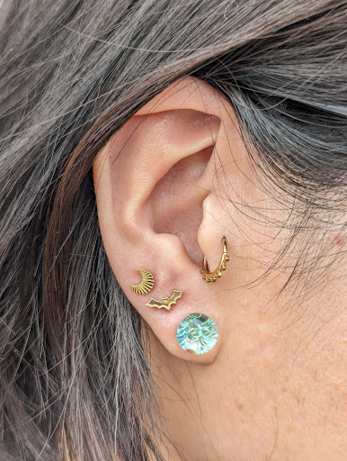 Explore sky tattoo ideas, creative tattoo ideas in Salem, available at Thistle Piercing & Fine Jewelry