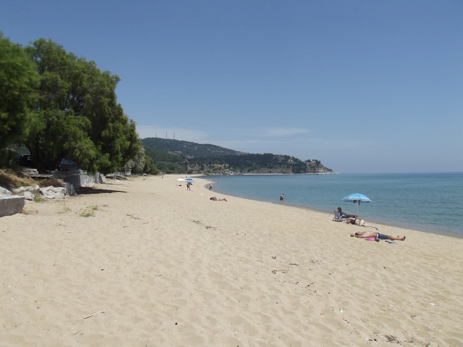 Zdjęcie Perigiali beach z powierzchnią jasny piasek