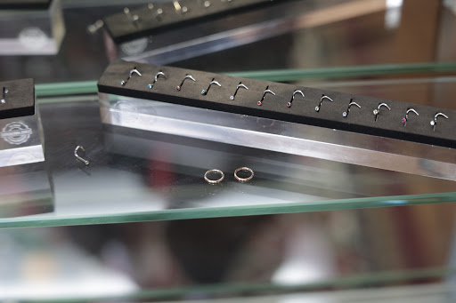 Explore beach tattoo ideas for guys, creative tattoo ideas in Des Moines, available at Axiom Body Piercing Studio