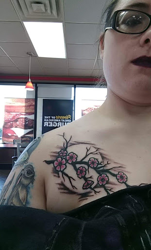 Explore singing tattoo ideas, creative tattoo ideas in Athens, available at United Ink Tattoos and Body Piercings