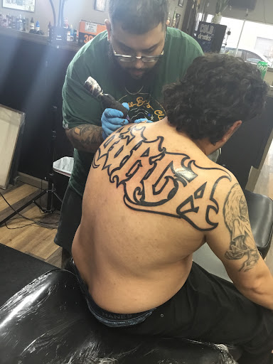 Explore leo tattoo ideas male, creative tattoo ideas in Kansas City, available at La plaza tattoo and art gallery