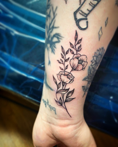 Explore hip tattoo ideas for females, creative tattoo ideas in Kokomo, available at Happys Tattoo Studio