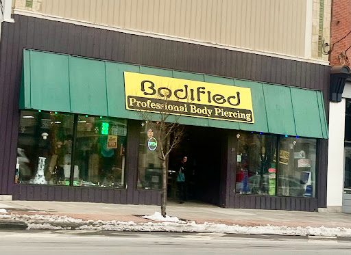 Explore tattoo flower sleeve ideas, creative tattoo ideas in Oswego, available at Bodified