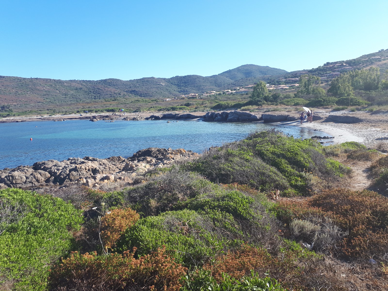 Foto van Spiaggia Isuledda II met kleine baai