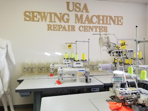 USA SEWING MACHINE REPAIR CENTER.