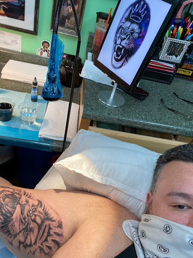 Tattoo Shop «Rock-A-Billy Tattoo & Piercing Studio», reviews and photos, 4576 N University Dr, Lauderhill, FL 33351, USA