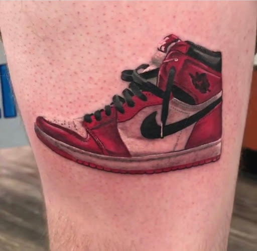 Find cool dog tattoo ideas for your next unique tattoo in Hazard at Lost Gypsy Tattoo